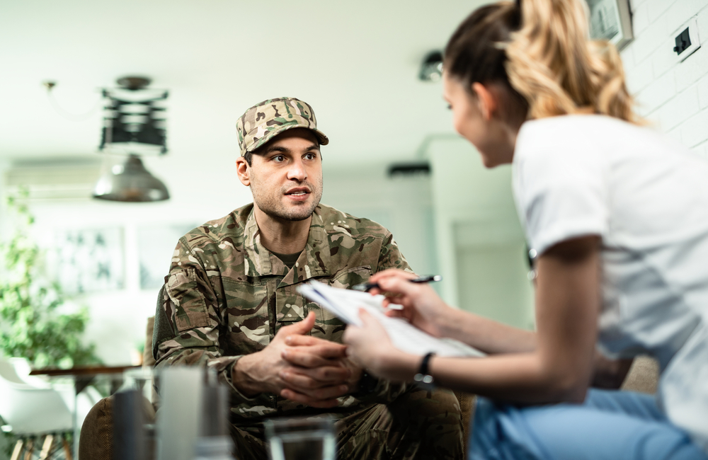 A VA nurse works with a veteran helping him receive the healthcare he needs. Working as a VA nurse is a rewarding career, serving those who have served.