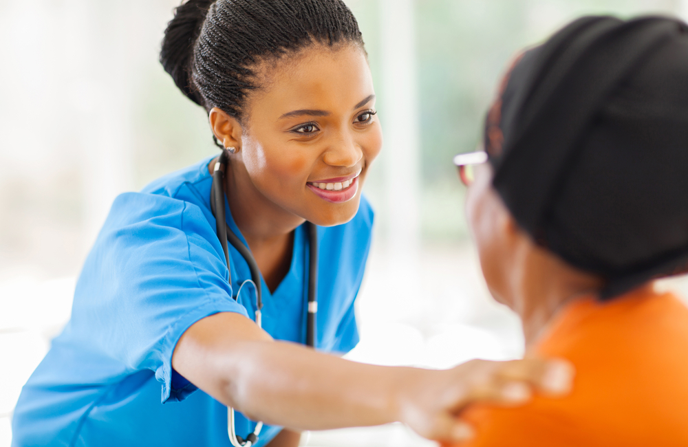 A nurse comforts a patient waiting for a procedure. Patient advocacy is part of what nurses do every day.