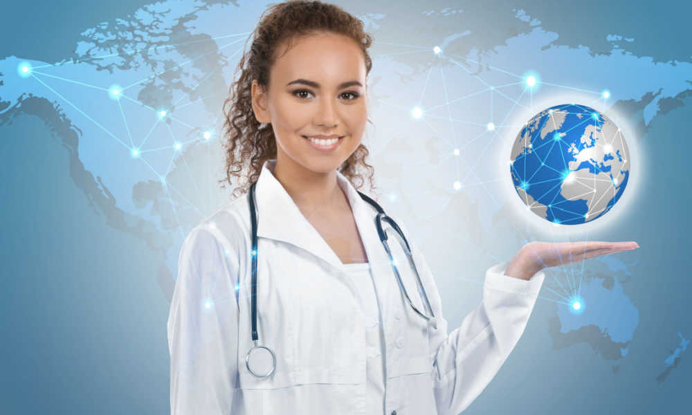 A conceptual image with a smiling nurse holding a globe with a world map backdrop behind her.